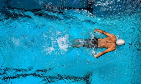 Vuojadeapmi Person Swimming on Body of Water